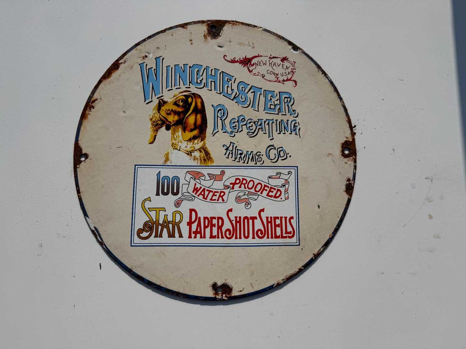 Lot 101 - WINCHESTER ARMS CO ENAMEL 12" DIA