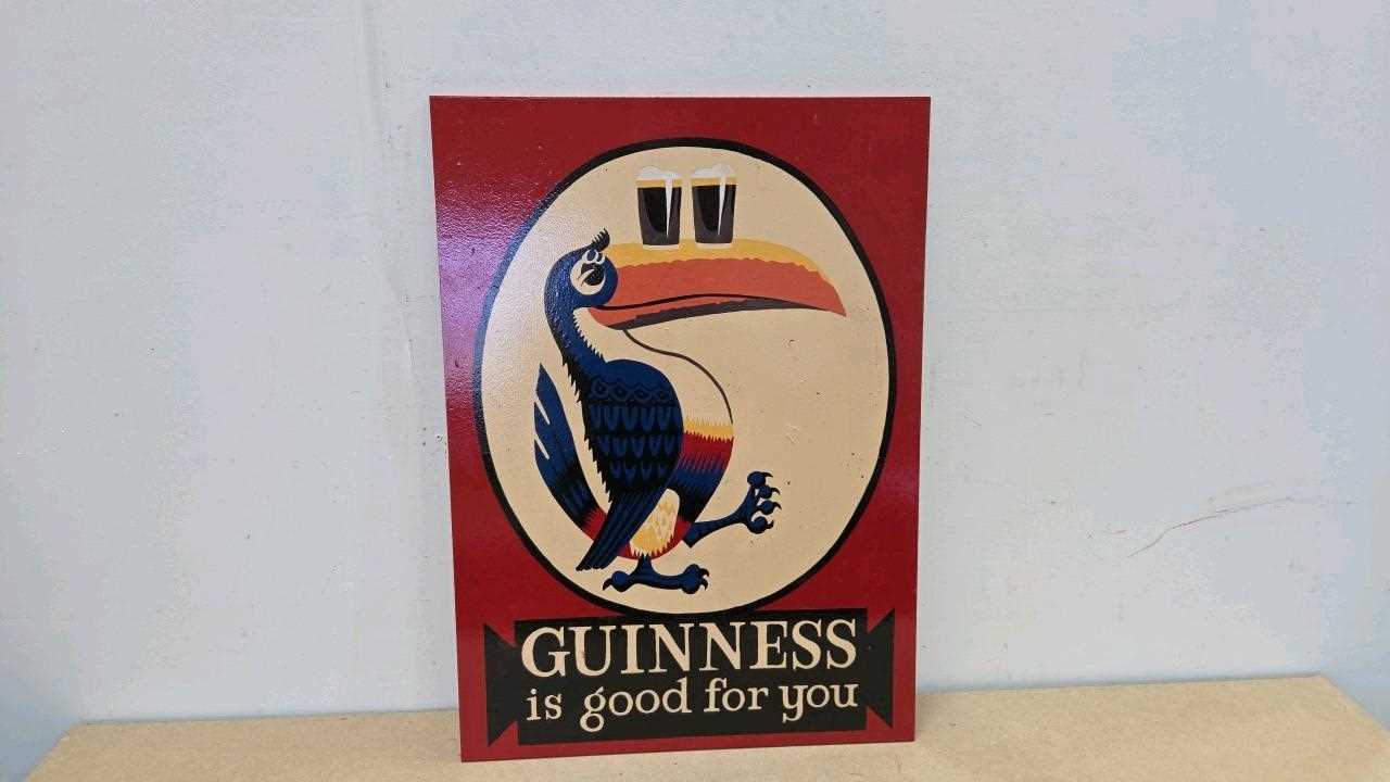 Lot 173 - WOODEN HAND PAINTED GUINNESS SIGN 28" X 20"