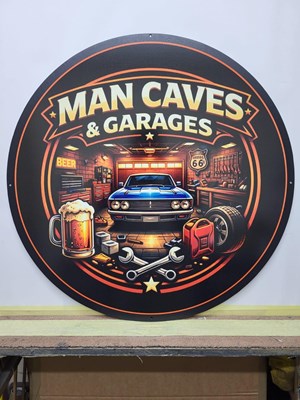 Lot 619 - MAN CAVES & GARAGES METAL SIGN 24" DIA