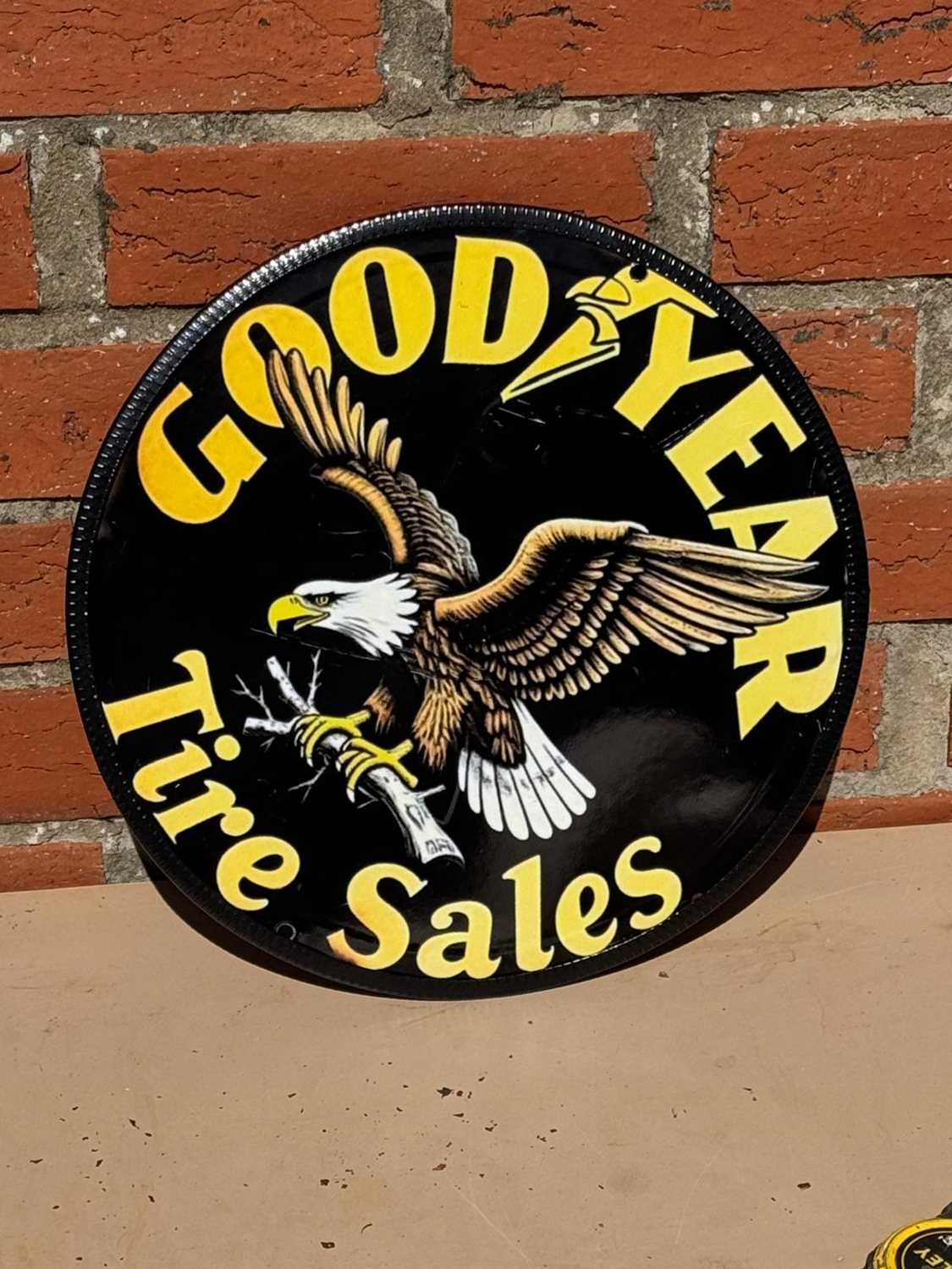Lot 75 - GOODYEAR TIRE SALES REPRO ENAMEL SIGN 12.3/4 " DIA