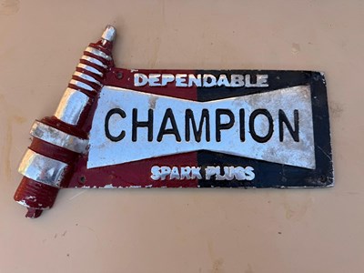 Lot 671 - CAST ALLY CHAMPION SPARK PLUGS SIGN 13" X 9"