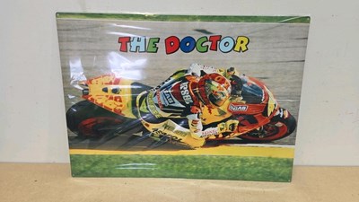 Lot 857 - VALENTINO ROSSI " THE DOCTOR " METAL PRINTED SIGN 27" X 20"