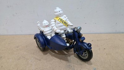 Lot 383 - CAST MICHELIN MEN ON A MOTOR CYCLE 9"