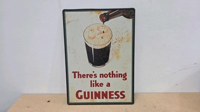 Lot 657 - THERE'S NOTHING LIKE A GUINNESS TIN REPRO SIGN 28" X 20"