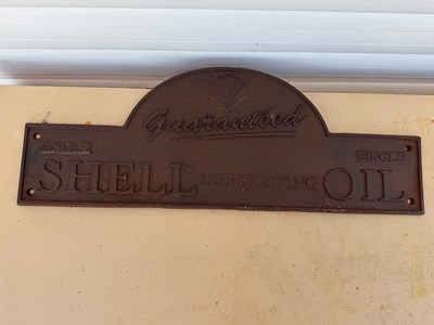 Lot 765 - SHELL LUBRICATING OIL CAST SIGN 19" X 7"
